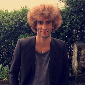 Marouane Fellaini dă în judecată o firmă de încălţăminte pentru 2,3 milioane de euro