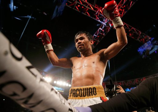 Pacquiao l-a învins pe Matthysse şi a câştigat centura WBA la categoria semimijlocie