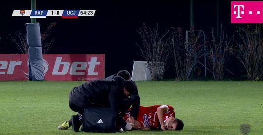 VIDEO Robert Neciu s-a accidentat grav în partida Rapid - Universitatea Cluj. Imagini greu de privit! Fotbalistul este suspect de ruptură de menisc