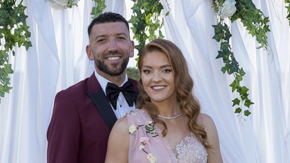 Canotorii Adriana Ailincăi şi Constantin Adam s-au căsătorit religios