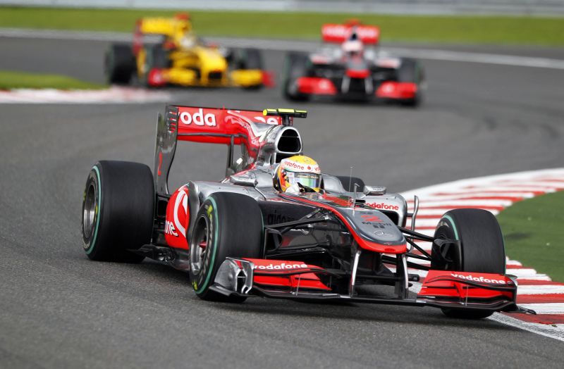 McLaren Formula One driver Lewis Hamilton of Britain leads the pack at the start of the Belgian F1 Grand Prix in Spa Francorchamps