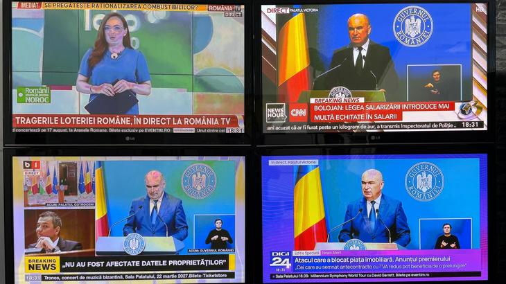 FOTO. România TV, singurul post de ştiri care nu a dat în direct conferinţa lui Bolojan. Cum era premierul prezent în burtiere